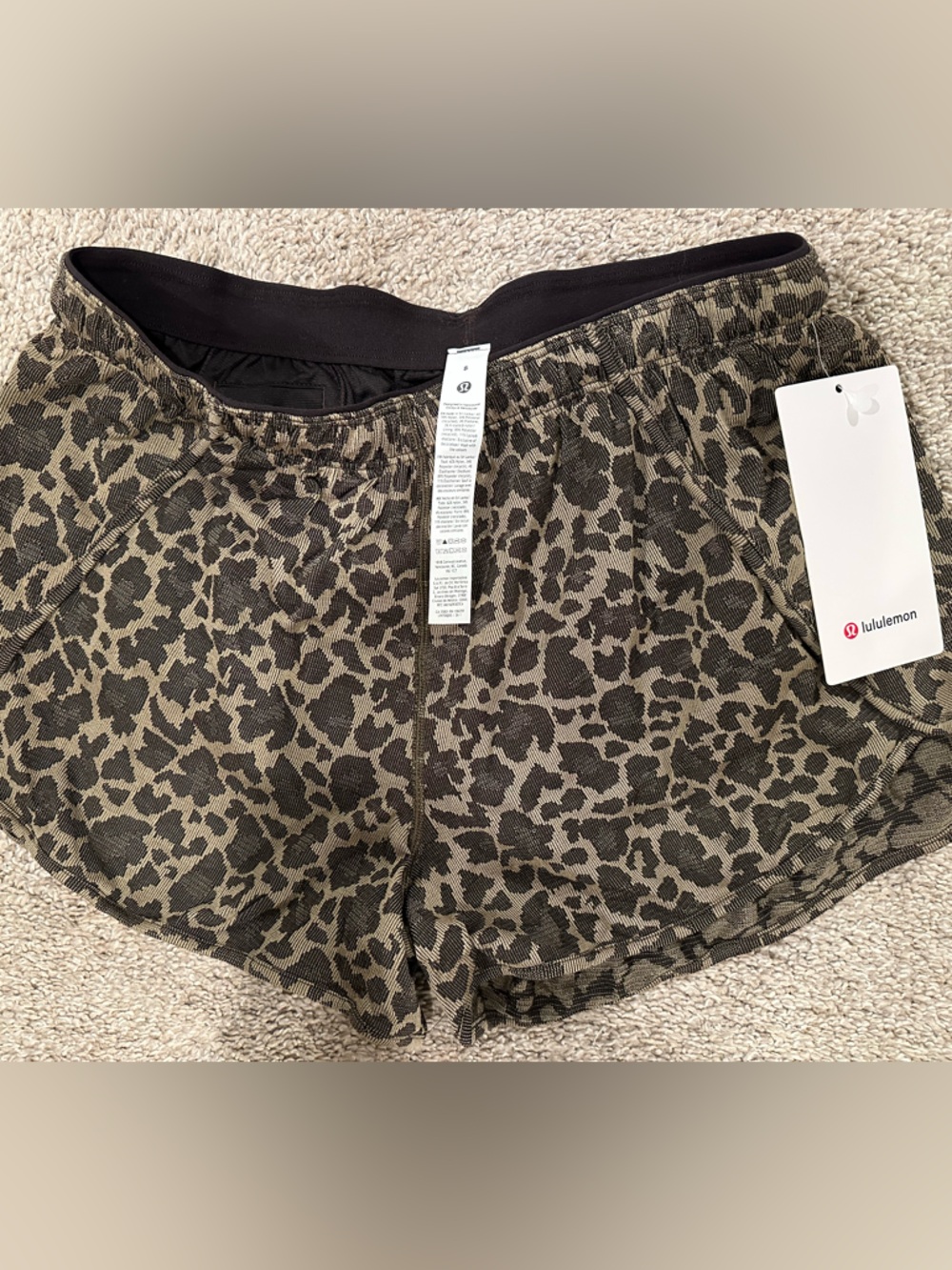 lululemon olive and black leopard print athletic shorts